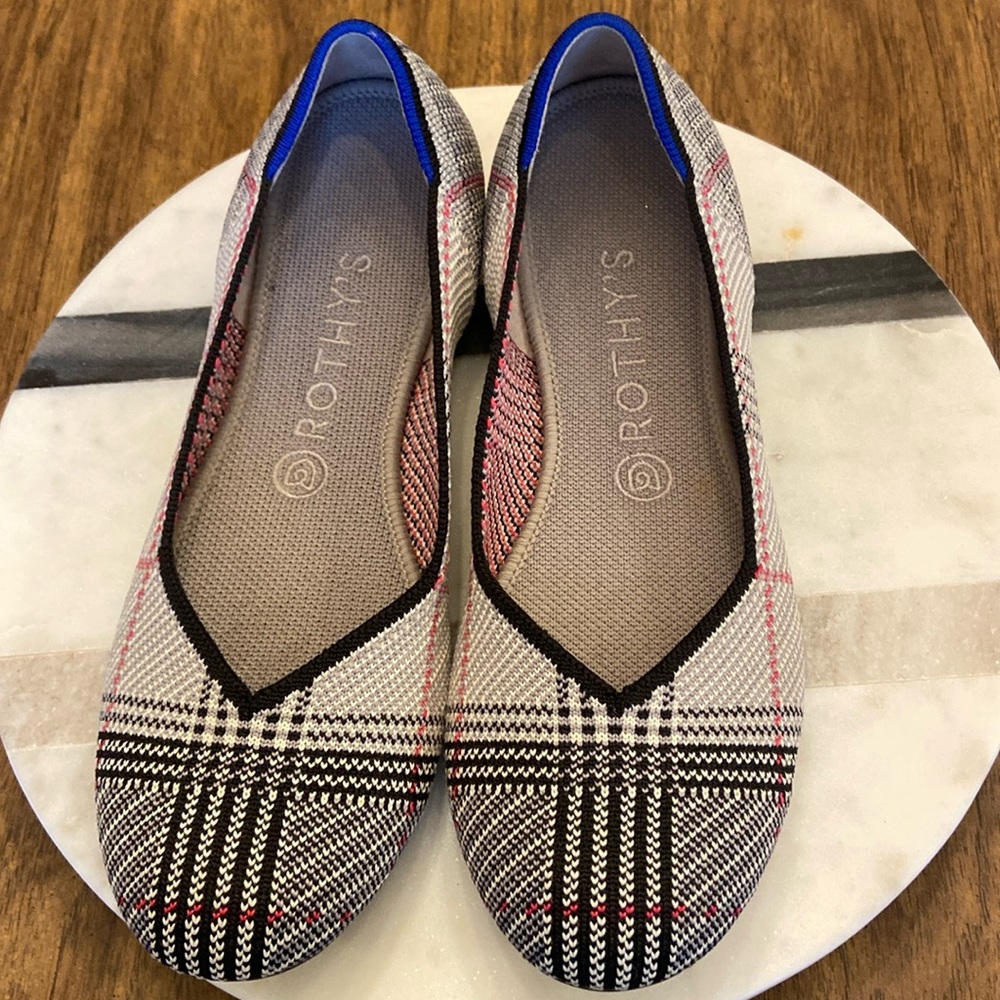 Rothy's Blue and Black Flats with Classic Elegance